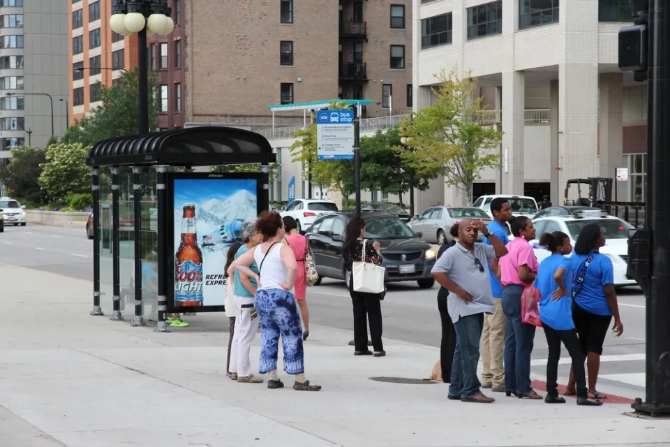 People waiting at a Chicago bus stop